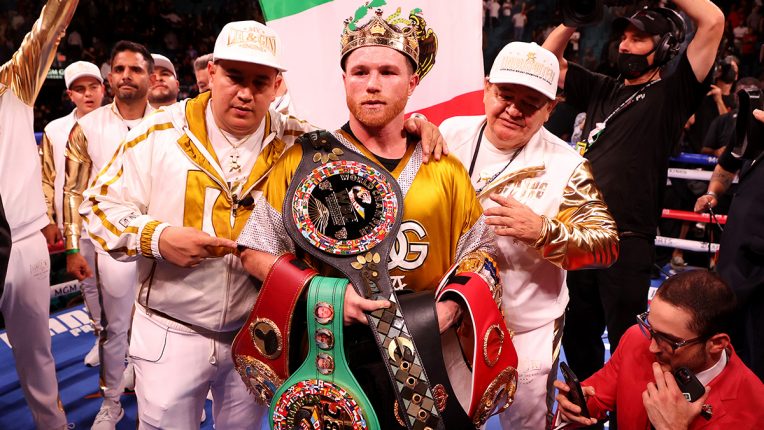 Canelo celebrating after becoming undisputed super-middleweight champion