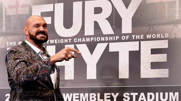 Tyson Fury laughing at his press conference at Wembley Stadium last month