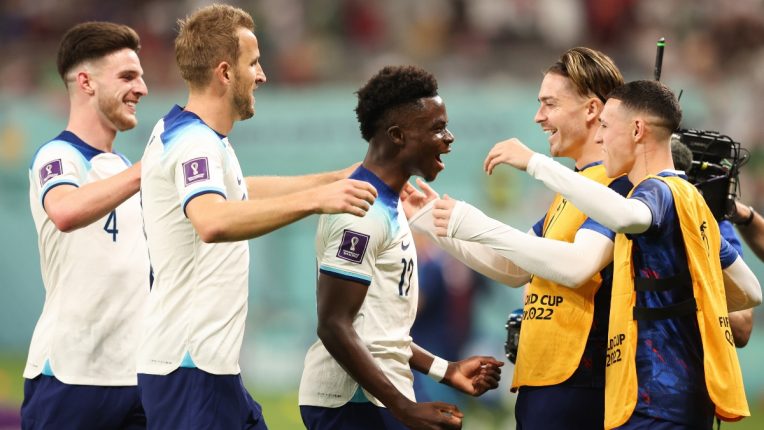 Bukayo Saka celebrates his second goal of the game and England's fourth