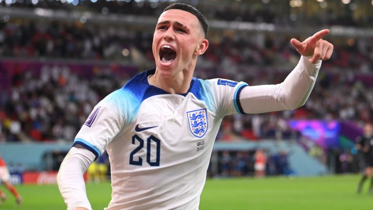 Phil Foden celebrates scoring England's second against Wales