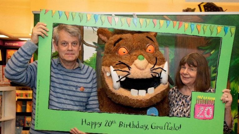 Axel Scheffler and Julia Donaldson pose for a photo with the Gruffalo