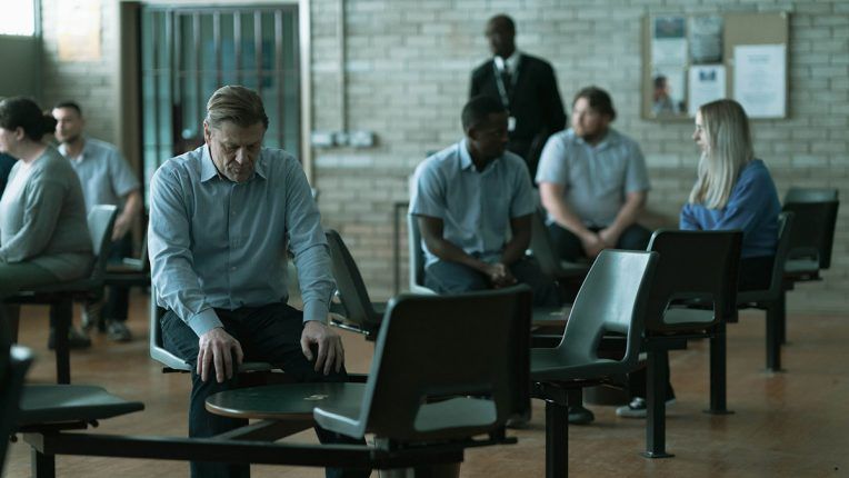Sean Bean as Mark Cobden in Time, sat in a prison visiting area