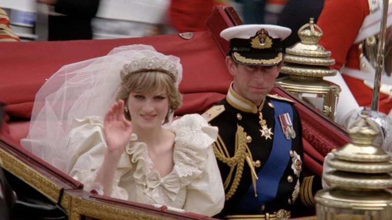 Charles and Diana on their wedding day in a carriage