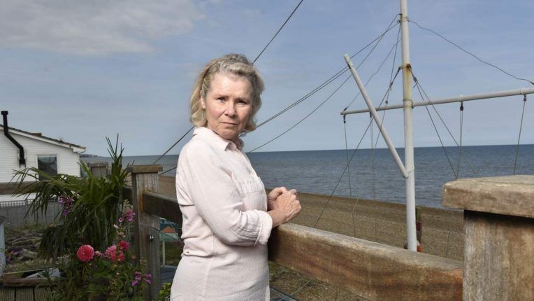 Imelda Staunton looks out onto the sea in Flesh and Blood