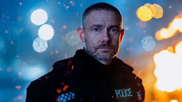 Martin Freeman in police costume as as Chris, a crisis-stricken, morally compromised, unconventional urgent response officer