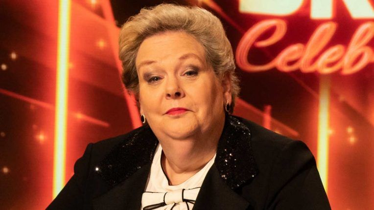 Anne Hegerty in the presenter's chair on Britain's Brightest Celebrity Family